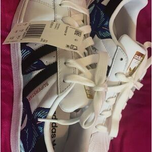Brand new, never worn. Women’s Adidas Superstar W.